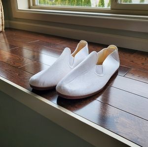 White slip ons
